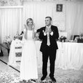 gorgeous stylish happy bride and groom performing their emotional first dance, wedding in a restaurant Royalty Free Stock Photo