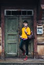 Gorgeous, stylish tourist exploring an old house