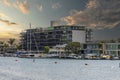 a gorgeous summer landscape at Horny Corner Beach with luxury apartments, blue ocean water, with boats and yachts docked Royalty Free Stock Photo