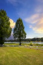 A gorgeous summer landscape at Lake Acworth with rippling blue lake water surrounded by lush green grass and trees Royalty Free Stock Photo