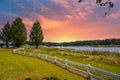 A gorgeous summer landscape at Lake Acworth with rippling blue lake water surrounded by lush green grass and trees Royalty Free Stock Photo