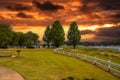 A gorgeous summer landscape at Lake Acworth with rippling blue lake water surrounded by lush green grass and trees Royalty Free Stock Photo