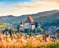 Gorgeous summer view of Fortified Church of Biertan, UNESCO World Heritage Sites since 1993. Captivating morning cityscape of Bier