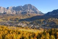 Gorgeous sunny view of Dolomite Alps with yellow larch trees. Colorful autumn panorama view landscape. Royalty Free Stock Photo