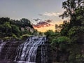 Gorgeous Sunrise Over a Waterfall Royalty Free Stock Photo