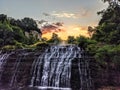 Gorgeous Sunrise Over a Waterfall Royalty Free Stock Photo