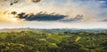 Gorgeous sunset over beautiful green vineyards. Aerial panorama sunset over Austrian grape hills in summer