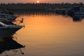 Gorgeous sunset over the sea on the dock boats