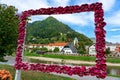 gorgeous town of Lasco in Slovenia with the Spica river bank in a flower frame
