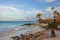 Gorgeous view of Aruba coast line landscape. Turquoise water of Atlantic ocean, white sand beach with palm trees. Royalty Free Stock Photo