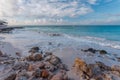 Gorgeous view of atlantic ocean coast line. Turquoise water surface merging with blue sky with white clouds. Aruba island. Royalty Free Stock Photo