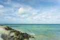 Gorgeous view of Atlantic ocean white sand coast line on turquoise water and blue sky with white clouds background. Royalty Free Stock Photo