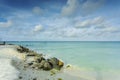 Gorgeous view of Atlantic ocean white sand coast line on turquoise water and blue sky with white clouds background. Royalty Free Stock Photo