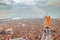 Golden statue of angel on top of clock tower in St Mark`s Square Royalty Free Stock Photo