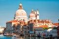 Gorgeous view of the Grand Canal and Basilica Santa Maria della Salute during sunset with interesting clouds, Venice, Italy Royalty Free Stock Photo