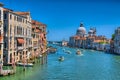 Gorgeous view of the Grand Canal and Basilica Santa Maria della Salute during sunset with interesting clouds, Venice, Italy, HDR