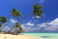 Gorgeous view of Indian Ocean, Maldives. White sand beach, turquoise water, blue sky and white clouds. Royalty Free Stock Photo