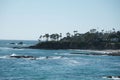 Gorgeous view of a peaceful beach in Laguna, California on a sunny day with a cloudless blue sky Royalty Free Stock Photo