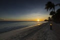 Gorgeous view of sunset in Atlantic ocean from sandy beach of island of Aruba.. Royalty Free Stock Photo