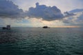 Gorgeous view of sunset on Indian Ocean, Maldives. Some boats on horizon line. Amazing nature landscape backgroun Royalty Free Stock Photo