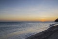 Gorgeous view of sunset on sandy beach of Eagle Beach in Atlantic Ocean on Aruba island. Royalty Free Stock Photo