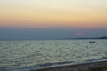 Gorgeous view on sunset on sea on summer day. Sea and sky converging on horizon. Royalty Free Stock Photo