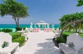 Gorgeous view of wedding ceremony event decorated gazebo against blue sky and ocean background Royalty Free Stock Photo