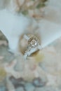 Gorgeous wedding band is displayed on a luxurious satin fabric Royalty Free Stock Photo