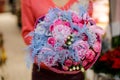 Gorgeous winter bouquet of pink and purple flowers