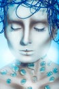 Gorgeous woman with creative hairstyle and body art Royalty Free Stock Photo