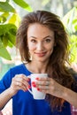 Gorgeous woman drinking a cup of coffee