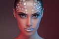 Gorgeous woman with fashion rhinestone make up