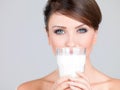 Gorgeous woman with a glass of fresh milk Royalty Free Stock Photo