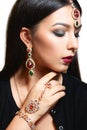 Gorgeous woman with luxurious jewelry close-up