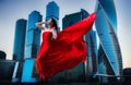 Gorgeous woman in red fluttered dress. Freedom concept. Fashion Royalty Free Stock Photo