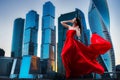 Gorgeous woman in red fluttered dress. Freedom concept. Fashion Royalty Free Stock Photo