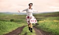 Gorgeous woman running on a countryside road Royalty Free Stock Photo