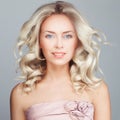 Gorgeous Woman with Windy Hair. Blonde Curly Hair Royalty Free Stock Photo