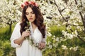 Gorgeous women with dark hair posing in spring garden Royalty Free Stock Photo