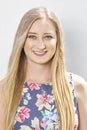 Headshot portrait of stunning young blonde woman