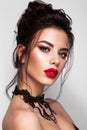 Gorgeous Young Brunette Woman face portrait. Red lips Royalty Free Stock Photo