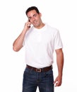 Gorgeous young man talking on his cellphone Royalty Free Stock Photo