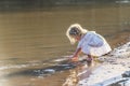 A Lovely Blonde Child Enjoys An Spring Day Outdoors Royalty Free Stock Photo