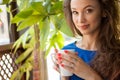 Gorgeous young woman drinking coffe in a coffee shop Royalty Free Stock Photo