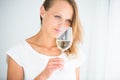 Gorgeous young woman with a glass of wine Royalty Free Stock Photo