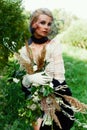 Woman holding bunch of wildflowers Royalty Free Stock Photo