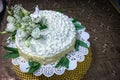 Gorgeously bird and flowers decorations on a homemade vanilla cake