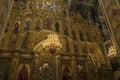 Gorgeously decorated golden altar and frescoes on the walls in interior of Holy Dormition Cathedral in Pechersk Lavra