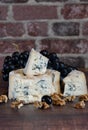 Gorgonzola blue mold cheese with grapes and nuts