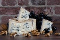 Gorgonzola blue mold cheese with grapes and nuts